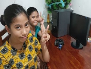 Sisters with new PC