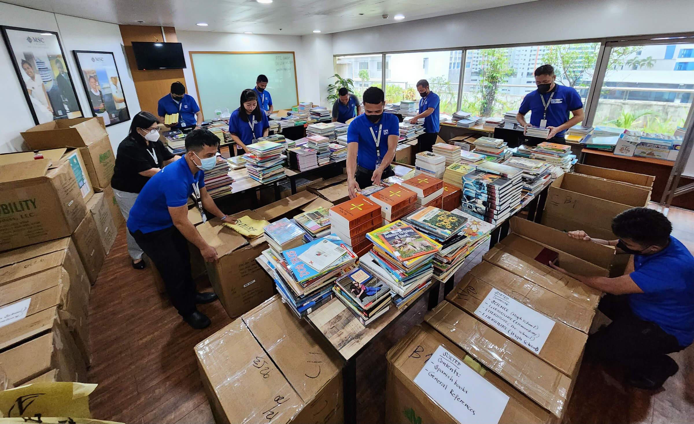 Sorting donated books