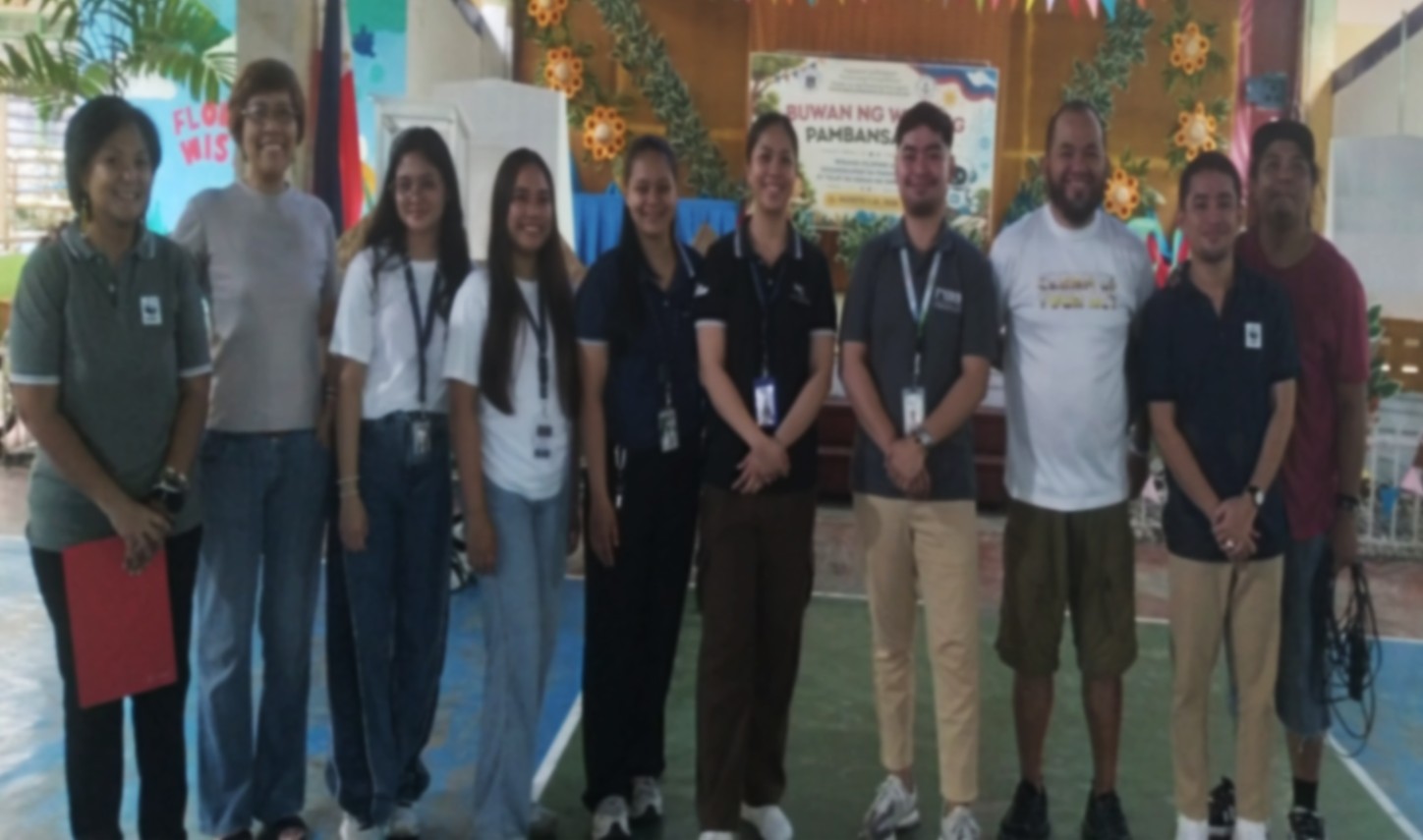 Commemorative group photo with students, WWF, and PTC